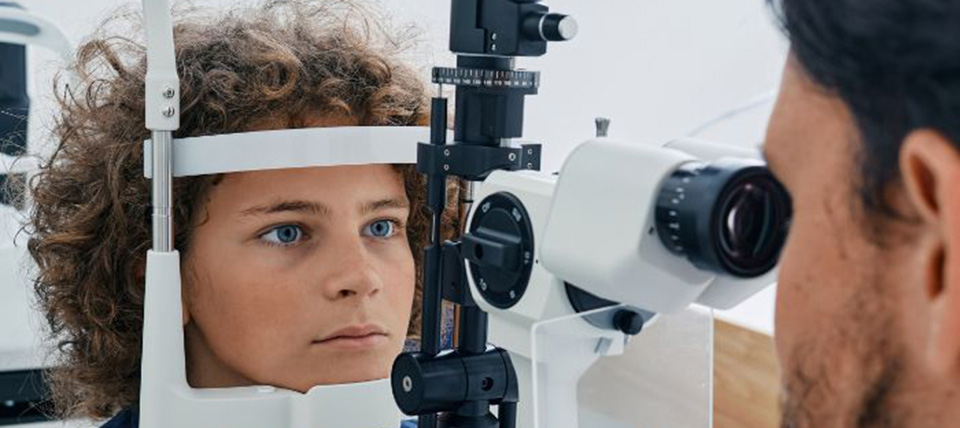 Child receiving an eye examination.