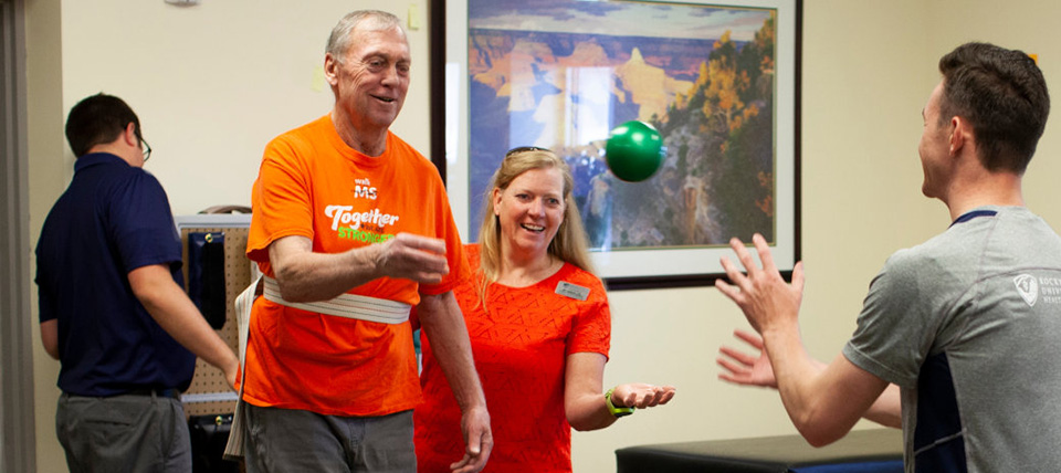 Man participating in physical therapy session.